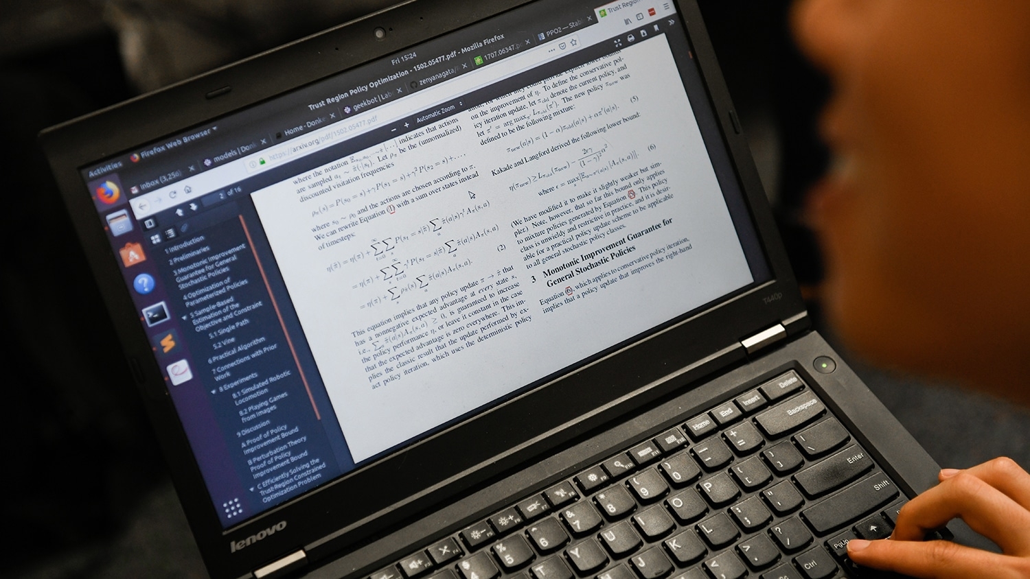 A student working on their laptop.